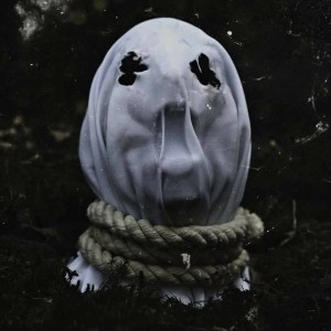 The Faceless - In Becoming a Ghost cover art